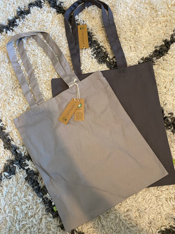Gepersonaliseerde tote bag met gegraveerd design – voorbeeld van graveerwerk.